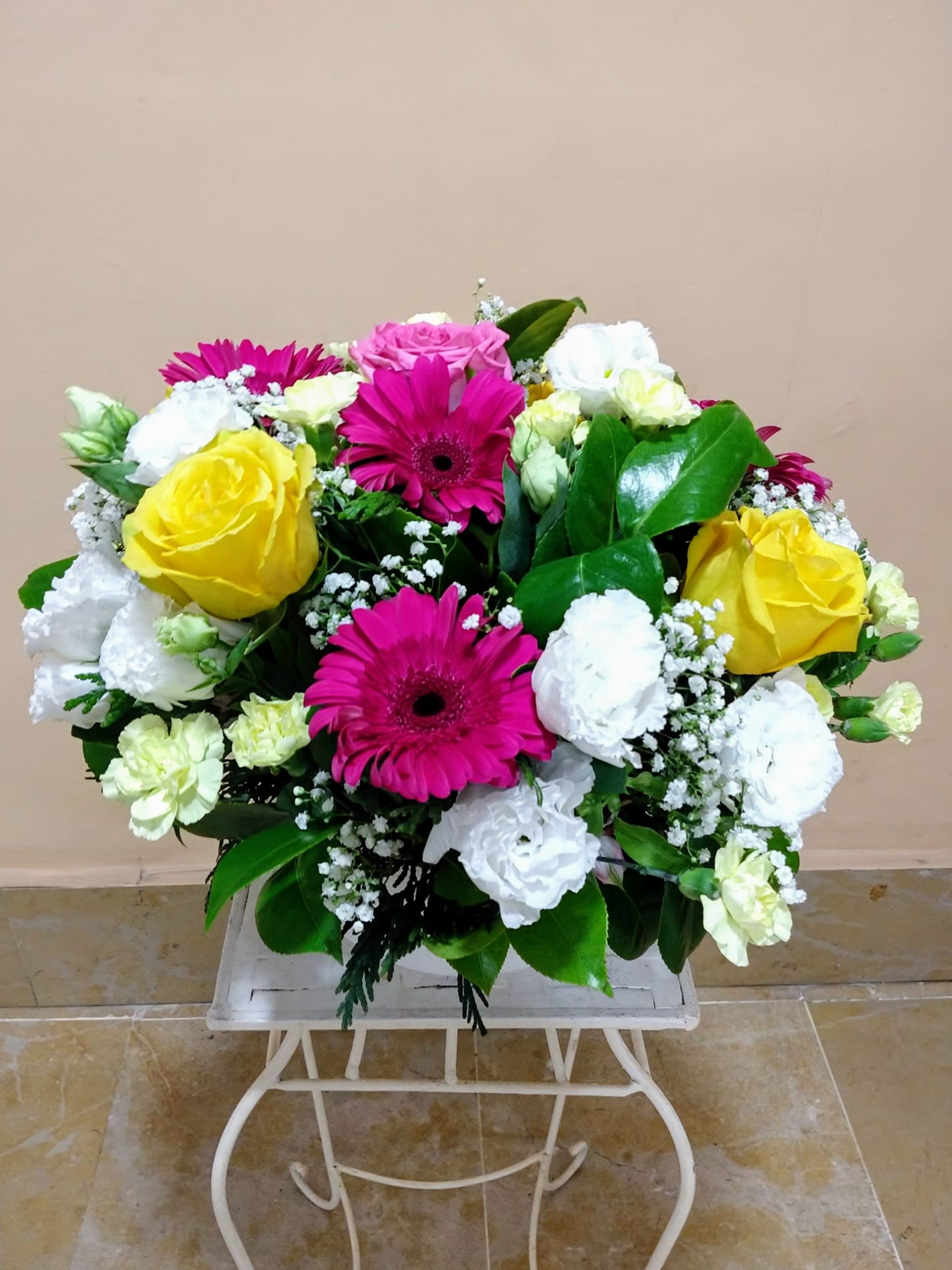 Spring Centerpiece with Yellow Roses
