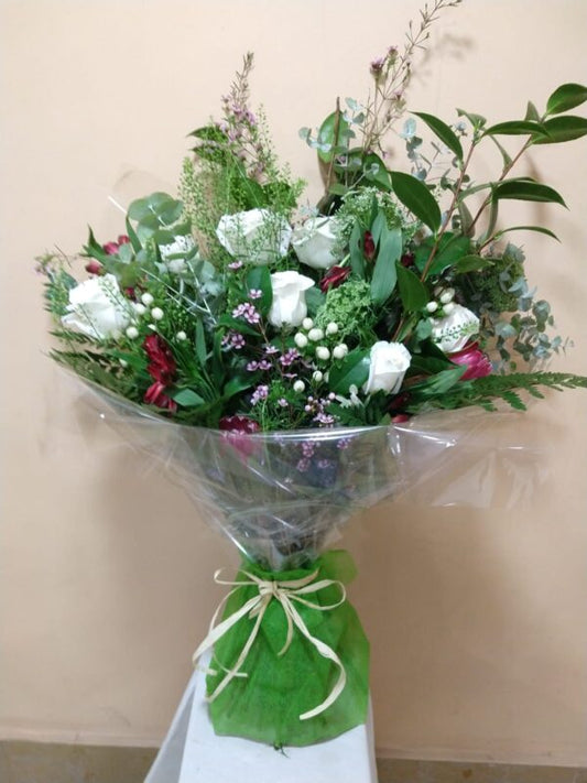 Wild bouquet with white roses